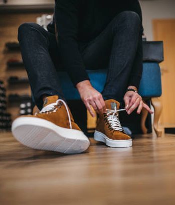 Young man shopping shoes